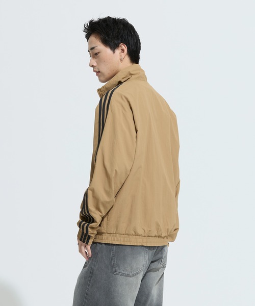 ADIDAS | アディカラー ウーブン ファイヤーバード トラックトップ
